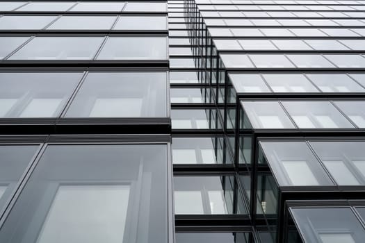 modern glass facade of an office building in Cologne