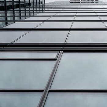 modern glass facade of an office building in Cologne