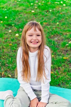 Photo of cute smiling girl with long hair