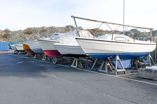 many boat on storage for the winter on the pier