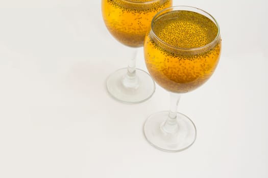 Two Glass of Saffron juice Isolated On White Background