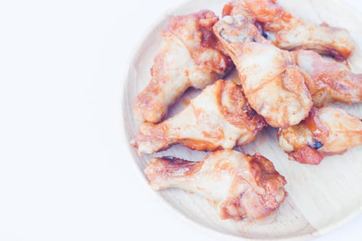 Grilled chicken wings isolated on white background, stock photo