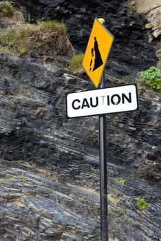 caution rock fall sign on Ballybunion beach in county Kerry Ireland