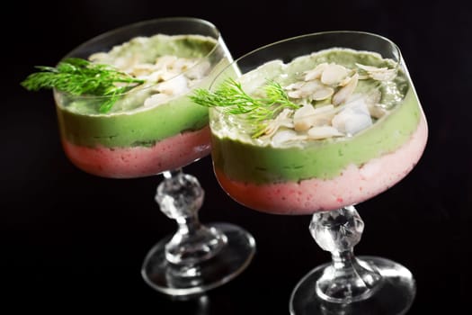 Crab mousse is made of crab meat or surimi, mascarpone, red bell pepper and garlic..Avocado mousse is made of avocados, mascarpone, green bell pepper, garlic, salt, lemon juice
