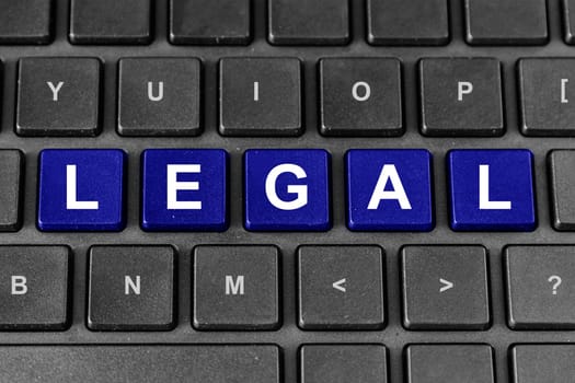legal blue word on keyboard