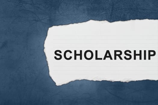 scholarship with white paper tears on blue texture