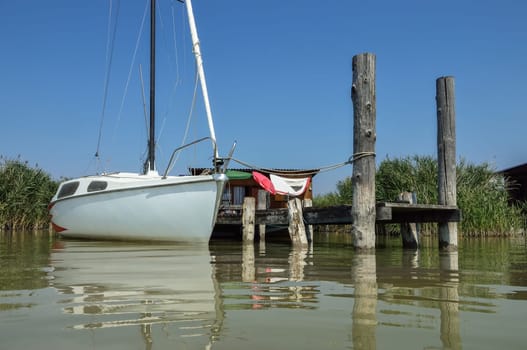 Sailboat at the jetty at Lake Neusiedlersee