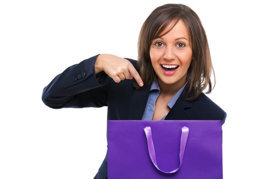 Businesswoman opening purple present with surprise isolated on white background