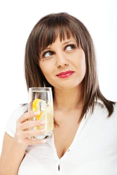 Woman drinking water with lemon