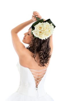 Young bride with wedding bouquet isolated on white background