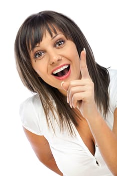 Cheerful caucasian woman with her finger on her head, looking at camera, expressing having an idea, isolated on white background