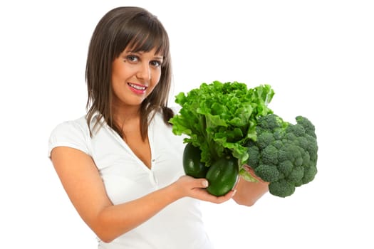 Young woman eating broccoli isolated on white