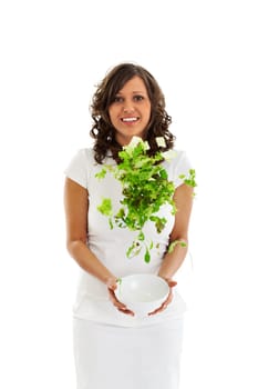 Young woman jumping with healhty salad isolated on white background