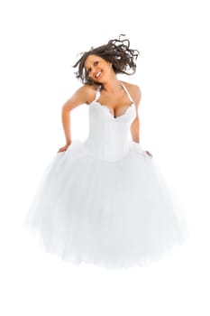 Young bride with jumping barefoot isolated on white background