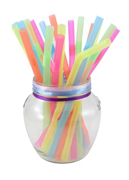 Colorful drink straw tubs in the glass, isolated on white.