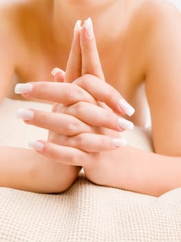 Young woman's french manicure, close up