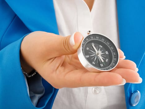 Businesswoman with compass