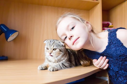 Image of beautiful girl with grey kitty