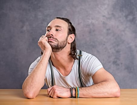 young man looking bored to the side