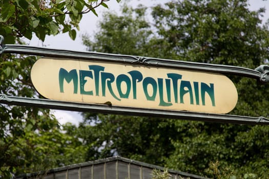 Ancient Metro Sign at the entrance of the Paris Metro