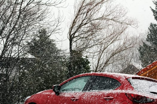 Winter road traffic. Heavy snowfall is dangerous for motorists