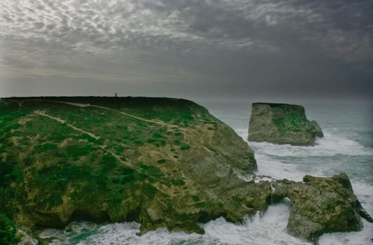 Stormy sunset at Saint Vicent cliffs, Algarve, Portugal