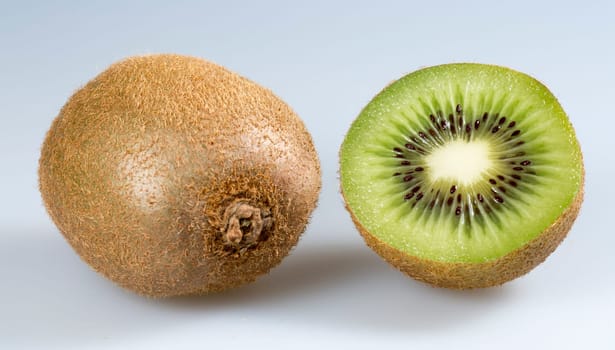 Kiwifruit Close Up. One sliced and one whole one.