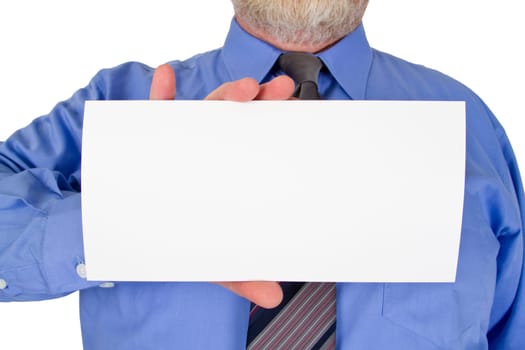 Businessman holds white sheet of paper