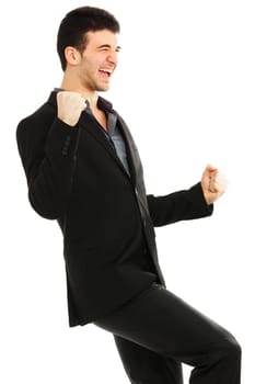 Young businessman punching the air from joy. Isolated on white background
