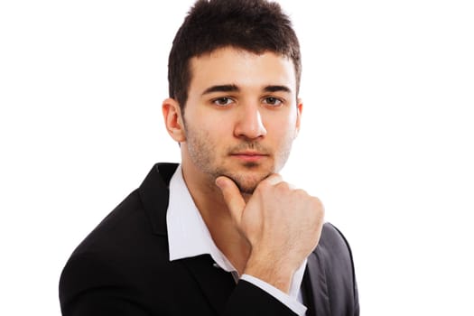 Young businessman looking at the camera. Isolated on white background