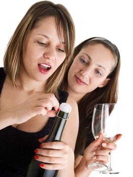 Girls celebrating with champagne isolated on white