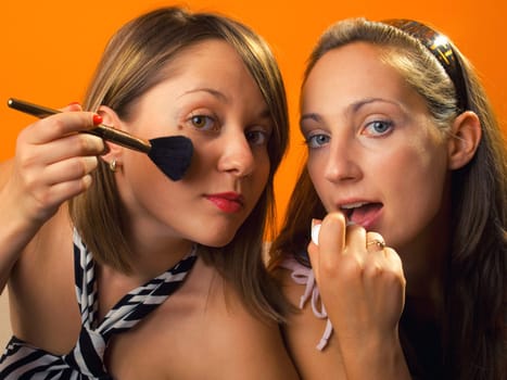 Women preparing make up