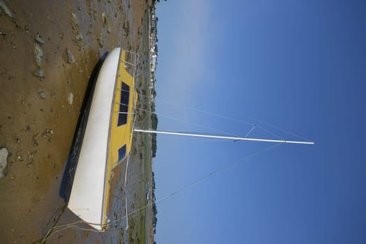 Sailboat at low tide