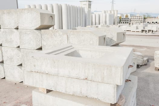 Concrete drainage pipes for industrial building construction.