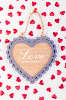 Love heart on wooden texture background, valentines day card concept.
