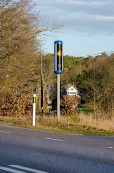 one speed camera on a swedish road ready to catch the driver