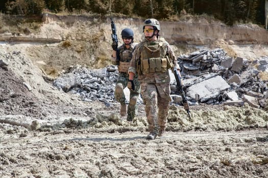 Members of Navy SEAL Team with weapons in action