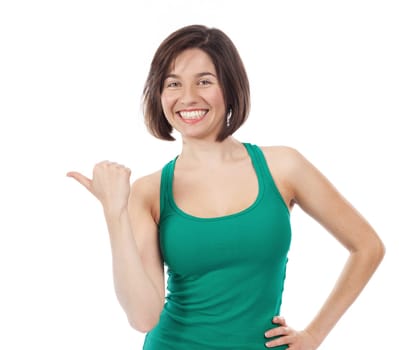 Pretty woman pointing up with her thumb, isolated on white