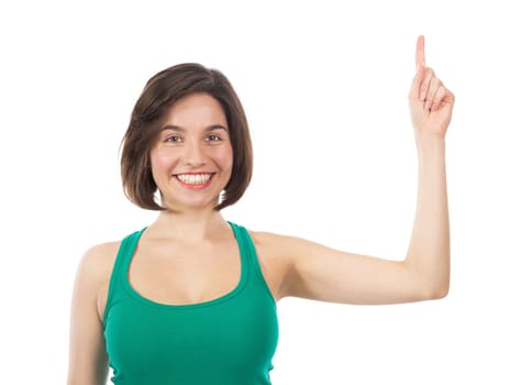 Happy woman displaying something with her finger, isolated on white