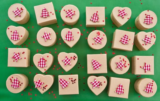 Small gifts for Christmas on a green background