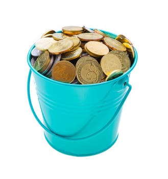 a full bucket of coins on white background