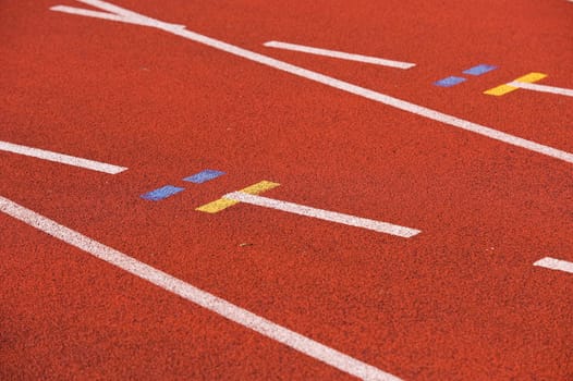 Finish line and numbers on red running track