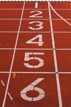 Finish line and numbers on red running track