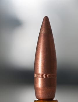Un fired .30 calliber ful metal jacket boat tail bullet