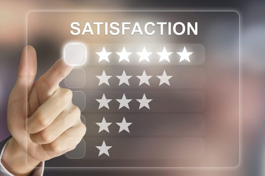 business hand clicking satisfaction on virtual screen interface