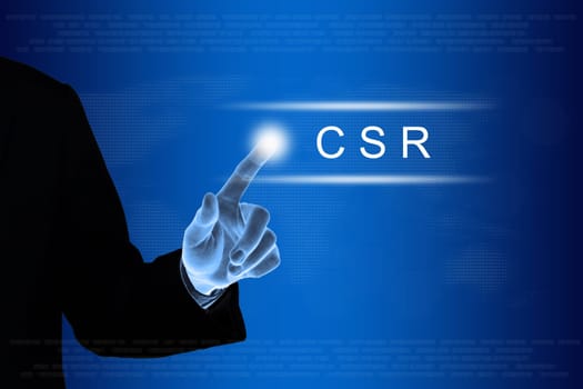 business hand pushing CSR or Corporate social responsibility button