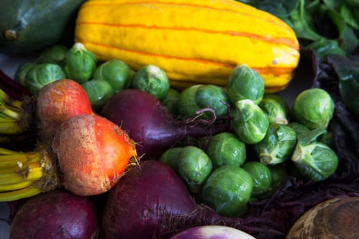 Fresh squash, brussels sprouts, and beets for a delicious winter soup.