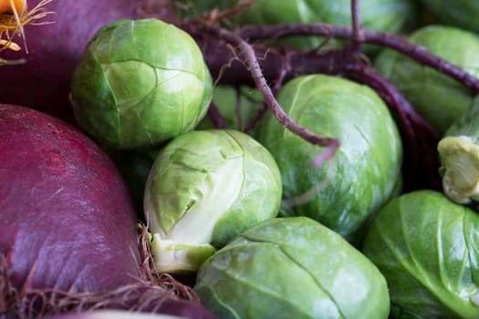 Fresh raw brussels sprouts with beetroots.