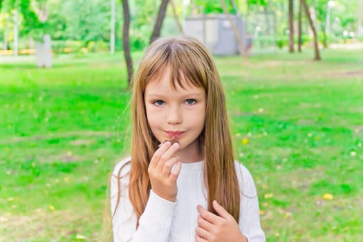 Photo of eating cute girl with long hair