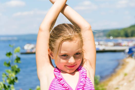 Photo of cute girl squint on the Sun
